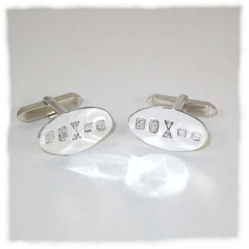 Silver oval cufflinks